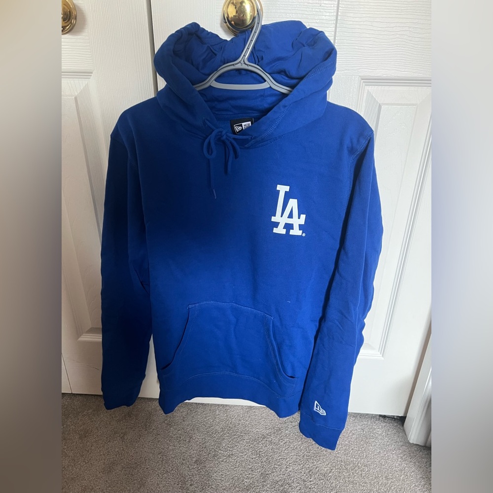 New Era Blue Hoodie with White Logo